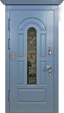 Железная дверь со стеклом и ковкой для коттеджа ДСК-128 в Ростове-На-Дону