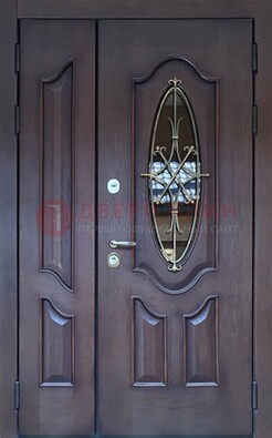 Темная металлическая дверь Винорит со стеклом и ковкой ДСК-239 в Рузе