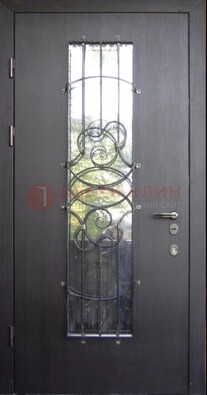 Остекленная стальная дверь с ковкой ДСК-26 в Санкт-Петербурге