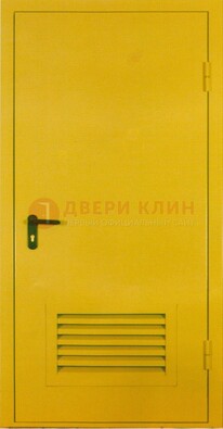 Желтая металлическая техническая дверь с вентиляционной решеткой ДТ-15 в Рузе
