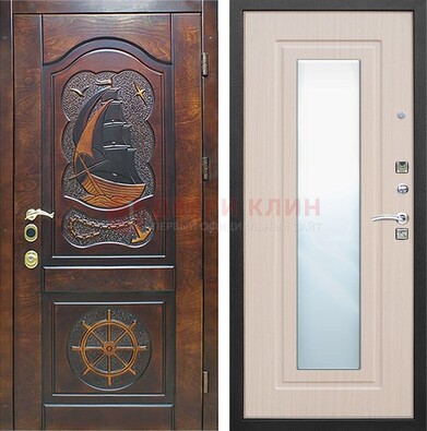 Темная уличная дверь с резьбой и зеркалом внутри ДЗ-49 в Рузе